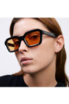 MELLER Nayah Black Orange Sunglasses
